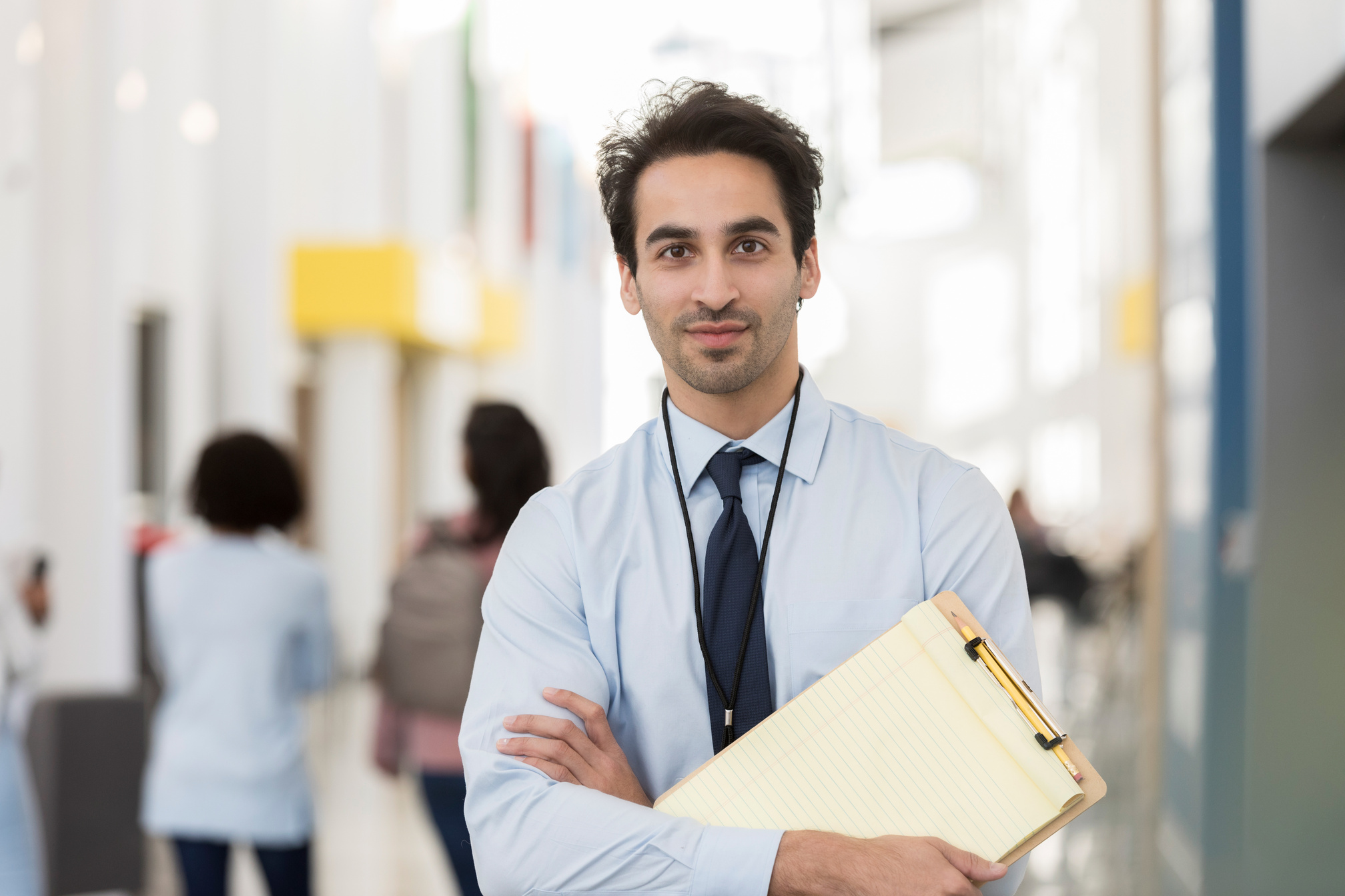 Portrait of confident male high school teacher